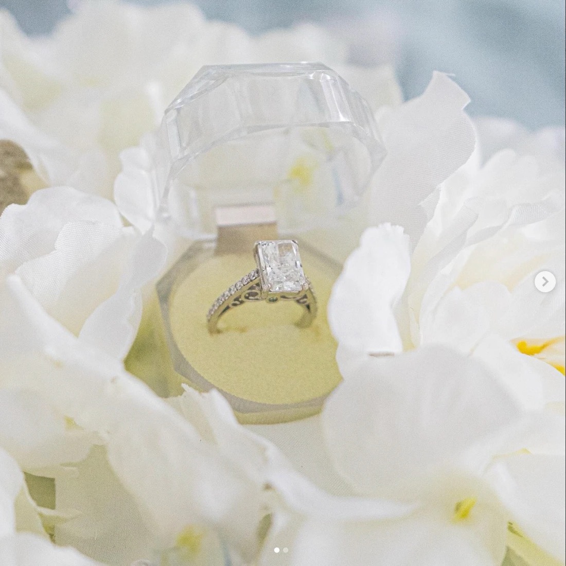 A radiant cut solitaire engagement ring